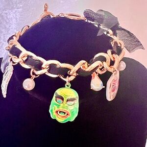 Rich Witch-Gold Tone Glow In The Dark Charms Chain Brace by Betsey Johnson